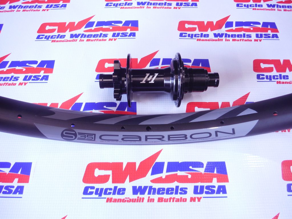 
                  
                    1/1 Hubs with IBIS Carbon Rims
                  
                